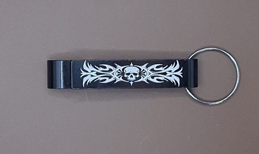 Porte clés décapsuleur tribal